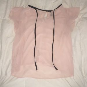 Baby pink and black blouse